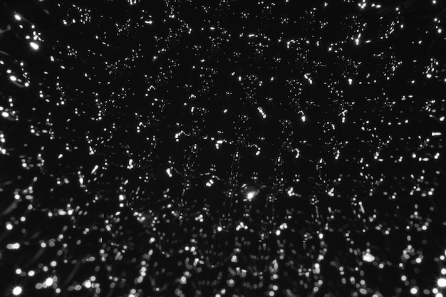 Extreme close-up ferromagnetic metal constellation on black shades 