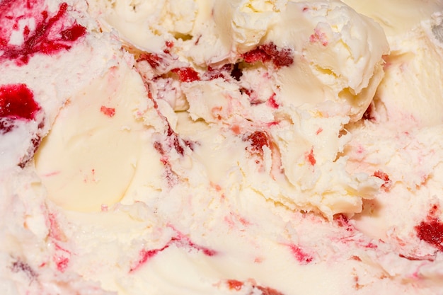 Extreme close-up ice cream with vanilla and strawberries