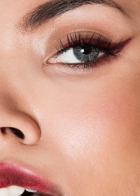 Extreme close-up shot model wearing elegant make-up