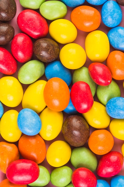 Free photo extreme close-up of sweet colorful candies