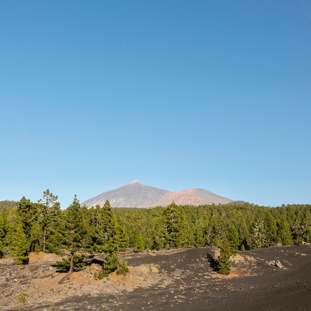 Extreme long shot mountain peak with clear sky