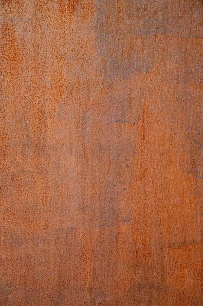Extremely close-up rusty brown iron wall