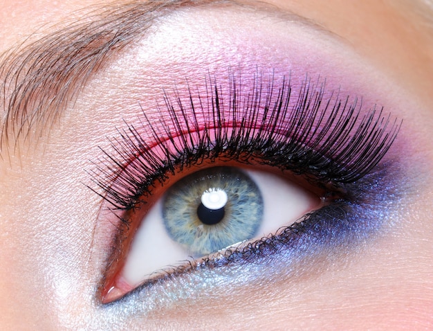 Free photo eye make-up with bright saturetad colors - macro shot