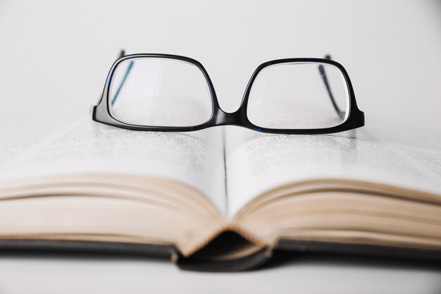 Eyeglasses placed on book
