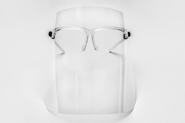 Eyewear with detachable face shield on a gray