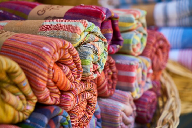 Free Photo fabrics rolled and stacked