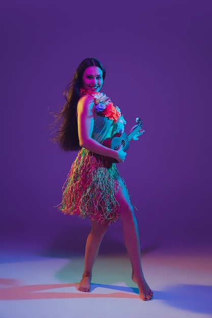 Fabulous Cinco de Mayo female dancer on purple  in neon light