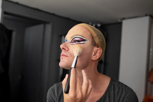 Fabulous drag queen getting her makeup ready