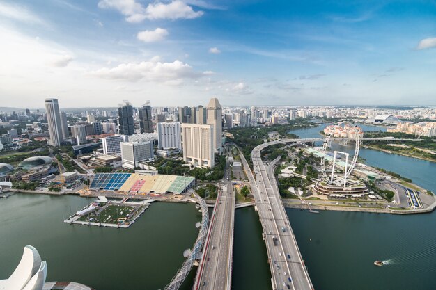 Fabulous top aerial view from the famous rooftop infinity pool on a sunny day overlooking the harbor and iconic skyscrapers.