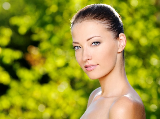 Free photo face of a beautiful young woman with clean skin