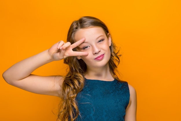 The face of playful happy teen girl