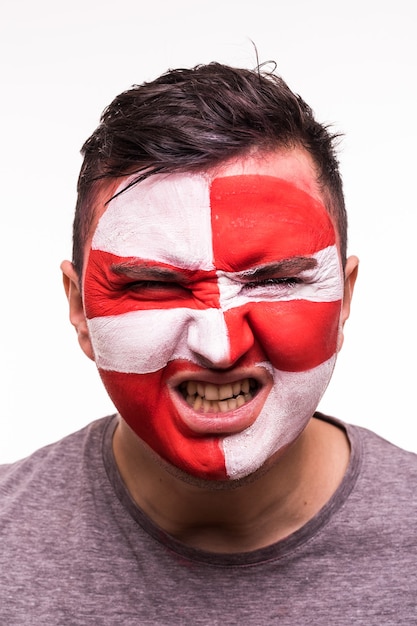 Face portrait of happy fan support Croatia national team shout with painted face isolated on dark background