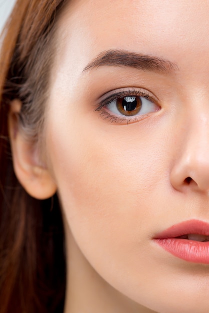 The Face of Woman on Gray – Free Stock Photos