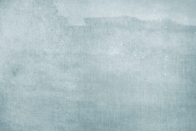 Faded blue color on a canvas textured background