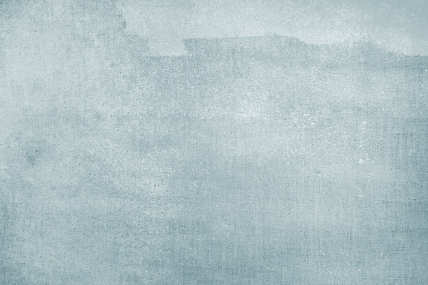 Faded blue color on a canvas textured background