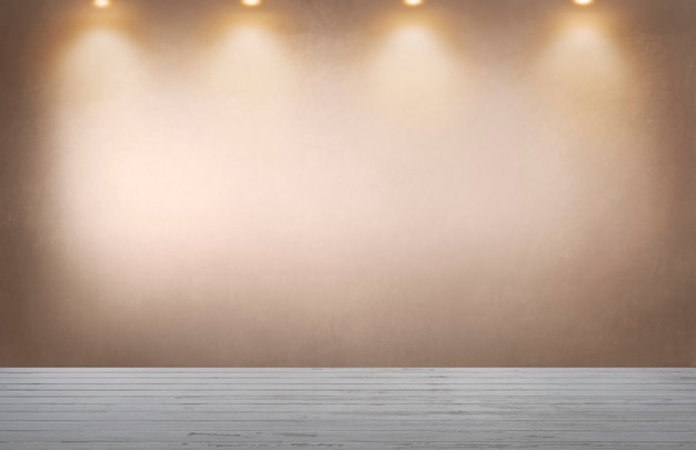 Free photo faded orange wall with a row of spotlights in an empty room