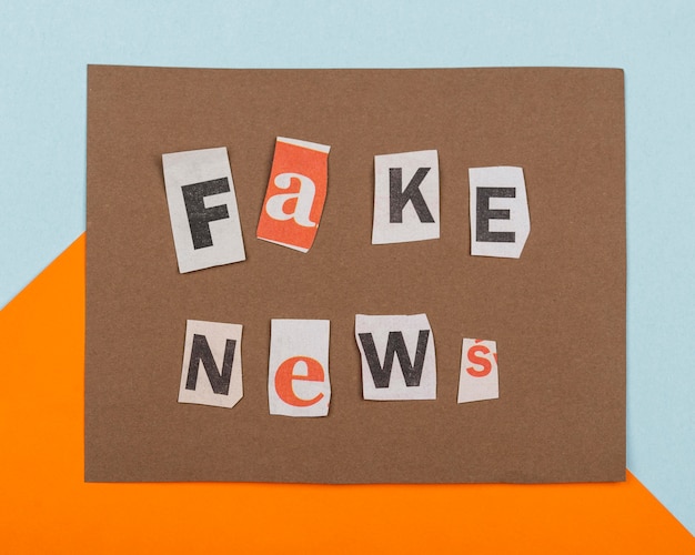 Free photo fake news with paper pieces