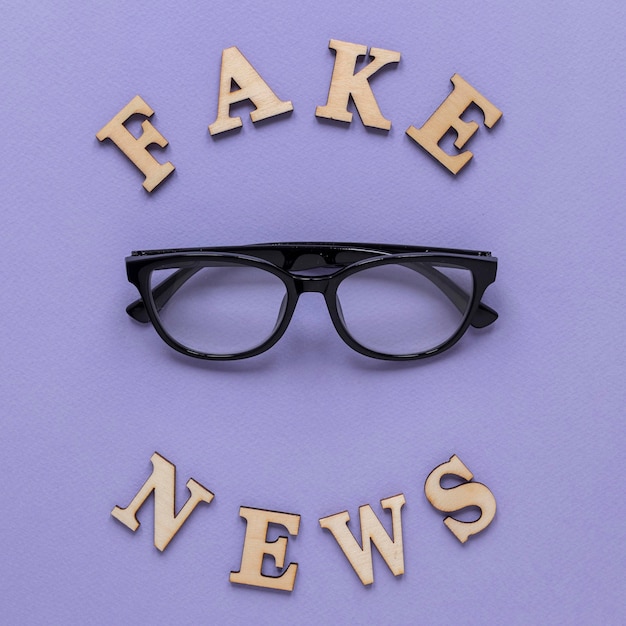 Fake news word with glasses