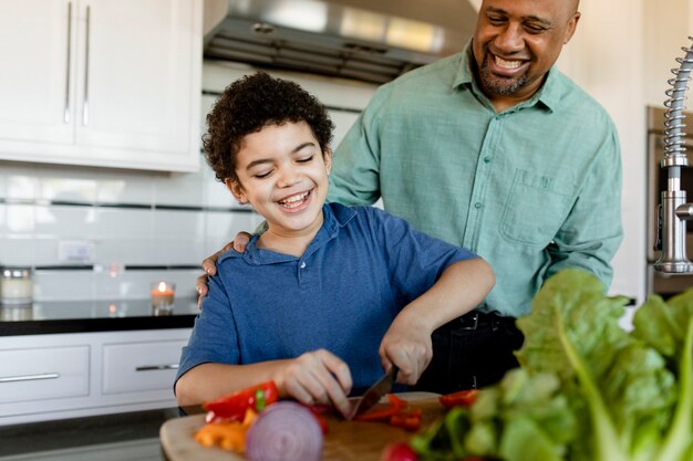 Family cooking breakfast together at home