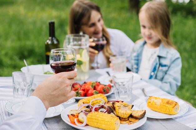 Family doing a barbecue in nature