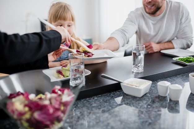 Family eating salad