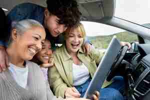 Free photo family enjoying a car trip