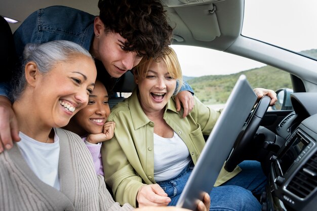 Family enjoying a car trip