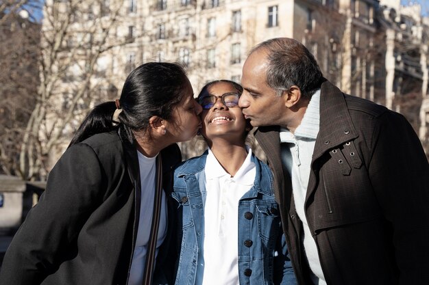 Free photo family enjoying their trip to paris