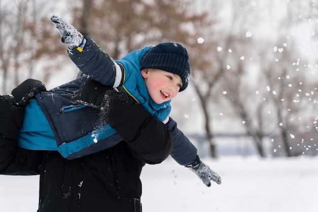 Family having fun in the snow