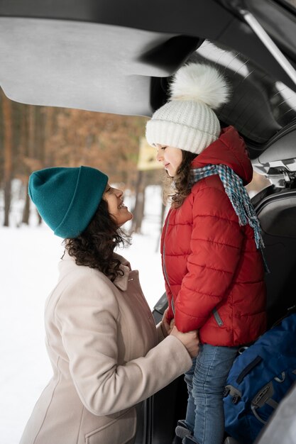 Family having fun during winter roadtrip