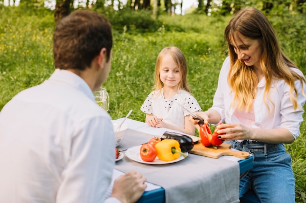 Family having a picnic in nature