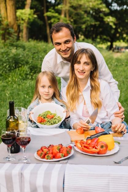 Family having a picnic in nature