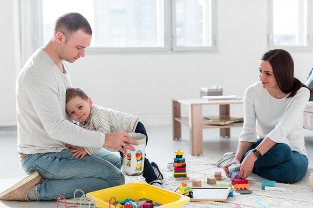 Family at home playing together