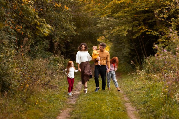 Family lifestyle outdoors in autumn time