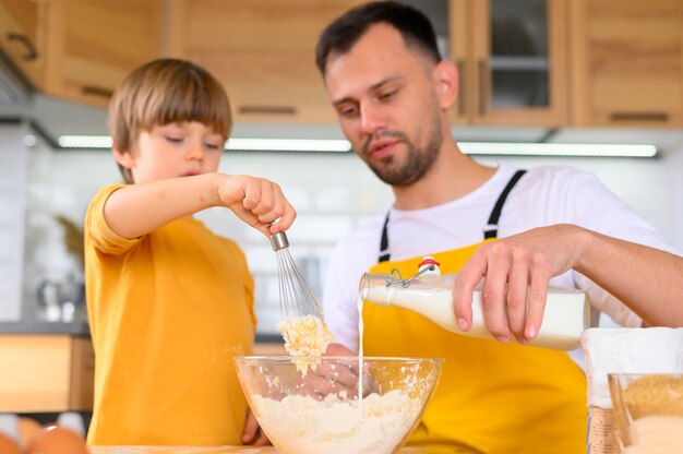 Family making a dough for food