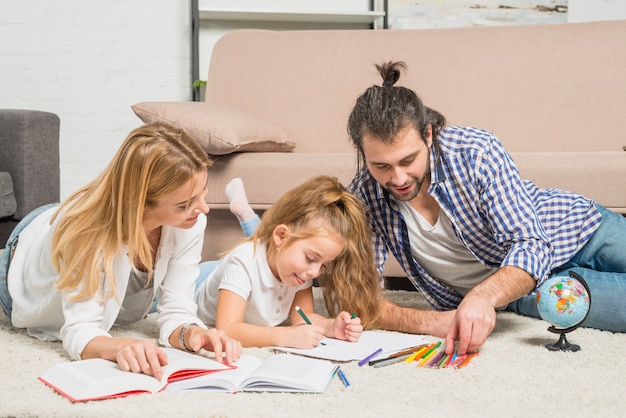 Free photo family painting on the floor