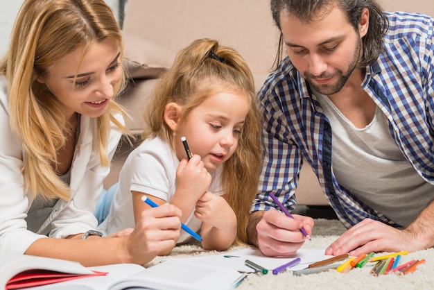 Free photo family painting on the floor