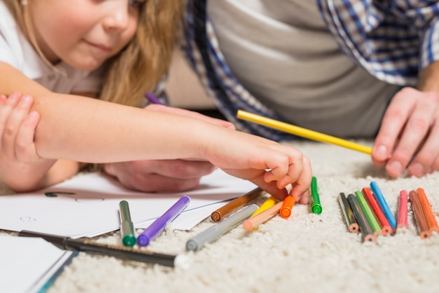 Free photo family painting on the floor