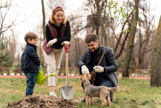 Family plating together in the ground outdoors