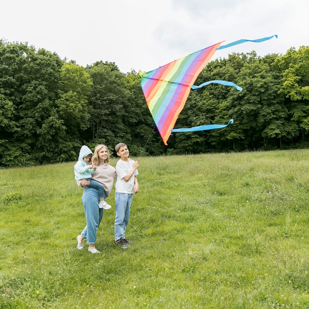 Family playing with a kite