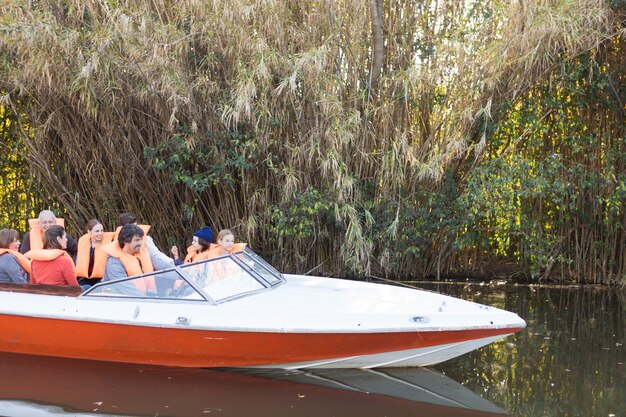 Family sailing on the river