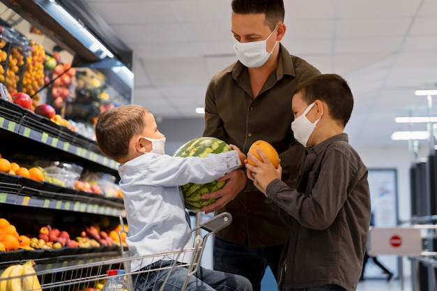 Family shopping with face mask