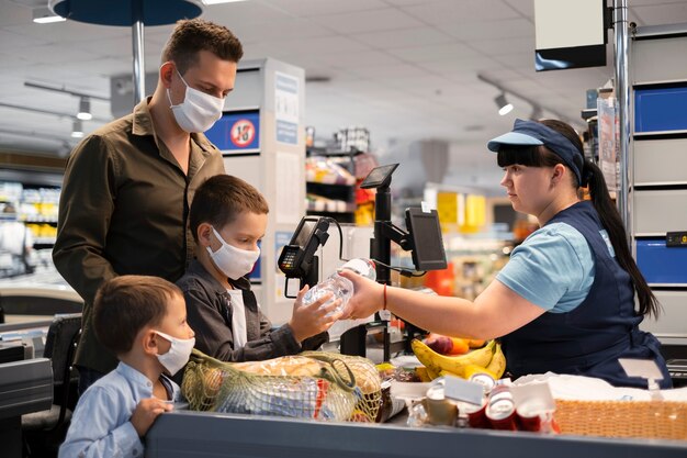 Family shopping with face mask