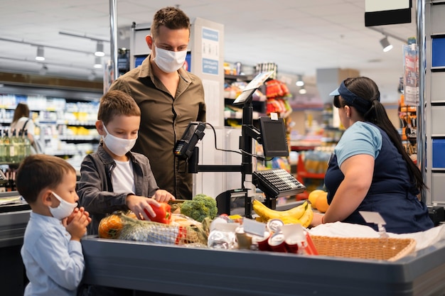 Family shopping with face mask