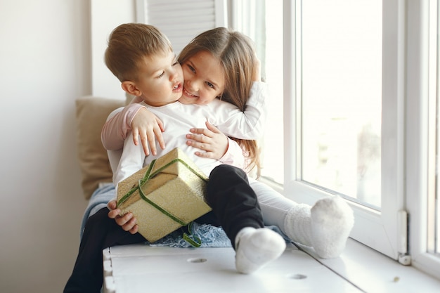 Family sitting at home with presents