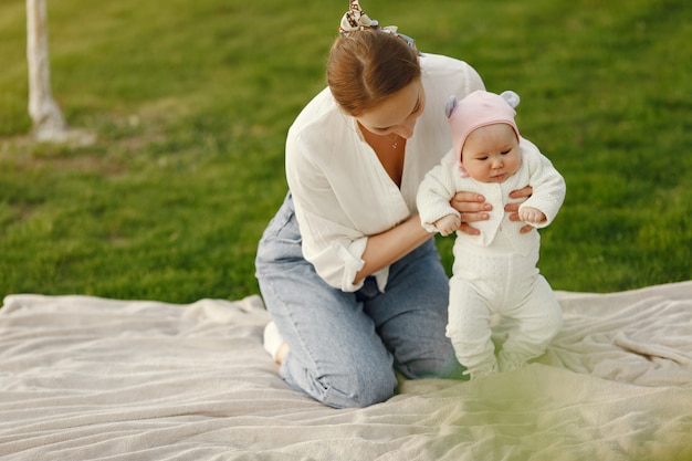 Family spend time in a summer garden