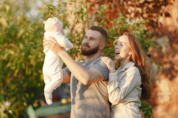 Family spend time in a summer garden