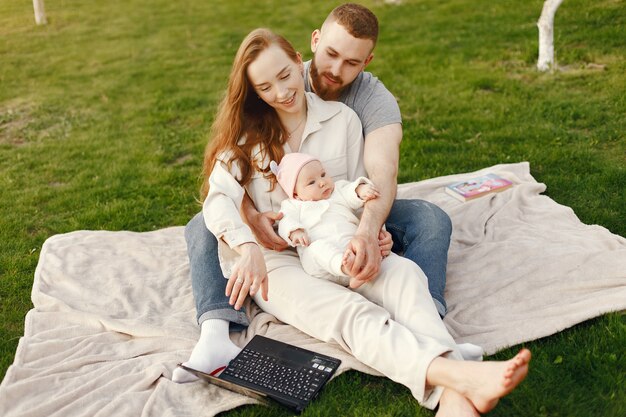 Family spend time in a summer garden