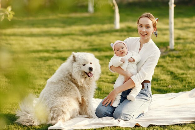 Family spend time in a summer garden