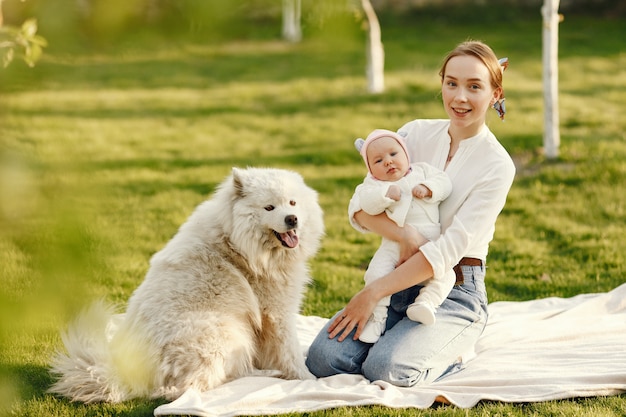 Family spend time in a summer garden